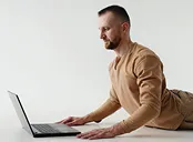 Bhudjangasana with laptop | Serhiy Hirchak RYT200 Yoga instructor